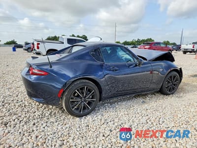 Trzecie zdjęcie samochodu z tyłu: 2026 MAZDA MX-5 MIATA GRAND TOURING VIN:JM1NDAM79T0702894 - miniatura