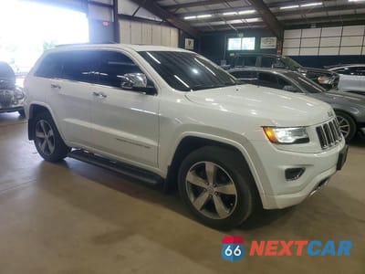 Czwarte zdjęcie samochodu z boku: 2014 JEEP GRAND CHEROKEE OVERLAND VIN:1C4RJFCG1EC395781 - miniatura
