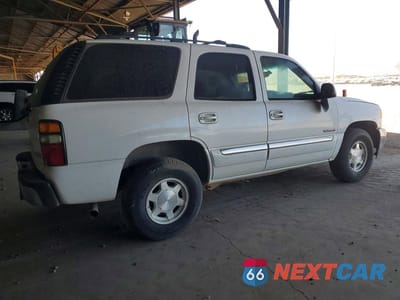 Trzecie zdjęcie samochodu z tyłu: 2004 GMC YUKON VIN:1GKEC13V24R209689 - miniatura