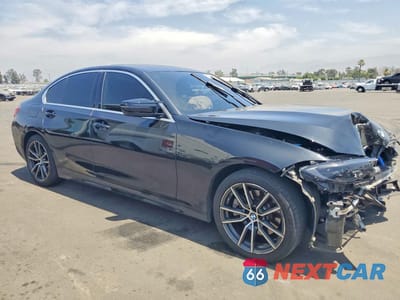 Czwarte zdjęcie samochodu z boku: 2021 BMW 330I VIN:3MW5R1J08M8B59261 - miniatura