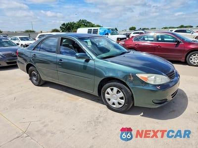 Czwarte zdjęcie samochodu z boku: 2002 TOYOTA CAMRY LE VIN:JTDBE32K920037190 - miniatura