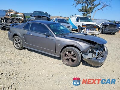 Czwarte zdjęcie samochodu z boku: 2004 FORD MUSTANG VIN:1FAFP40664F212699 - miniatura
