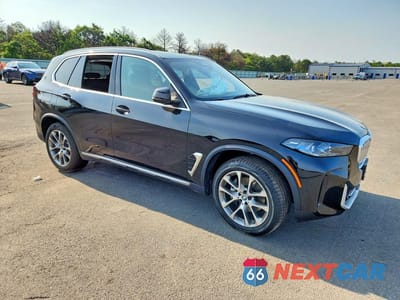 Czwarte zdjęcie samochodu z boku: 2026 BMW X5 XDRIVE40I VIN:5UX23EU08T9148550 - miniatura