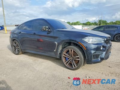 Czwarte zdjęcie samochodu z boku: 2015 BMW X6 M VIN:5YMKW8C52F0G93976 - miniatura