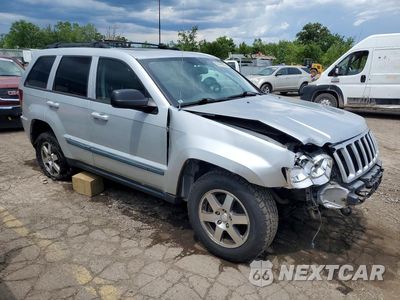 Czwarte zdjęcie samochodu z boku: 2009 JEEP GRAND CHEROKEE LAREDO VIN:1J8GR48K79C527071 - miniatura