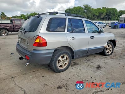 Trzecie zdjęcie samochodu z tyłu: 2004 HYUNDAI SANTA FE GLS VIN:KM8SC13D34U658992 - miniatura
