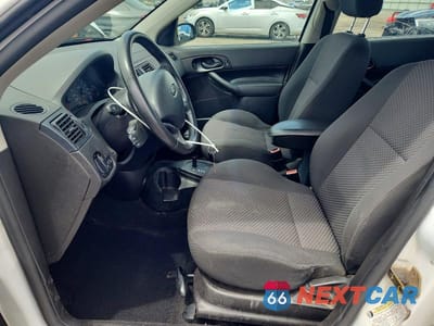 Zdjęcie 7 z 12 samochodu: 2005 FORD FOCUS ZX5 VIN:3FAFP37N55R107759 - miniatura