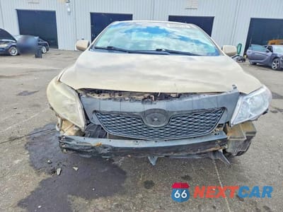 Piąte zdjęcie samochodu w środku: 2010 TOYOTA COROLLA LE VIN:2T1BU4EE9AC383016 - miniatura