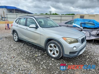 Czwarte zdjęcie samochodu z boku: 2013 BMW X1 SDRIVE28I VIN:WBAVM1C55DVW41934 - miniatura