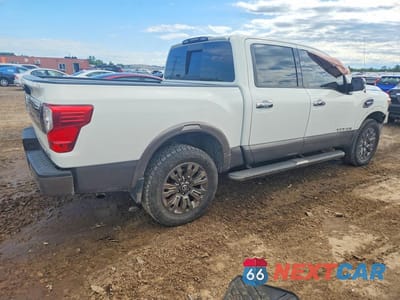 Trzecie zdjęcie samochodu z tyłu: 2017 NISSAN TITAN PLATINUM RESERVE VIN:1N6AA1E58HN530028 - miniatura