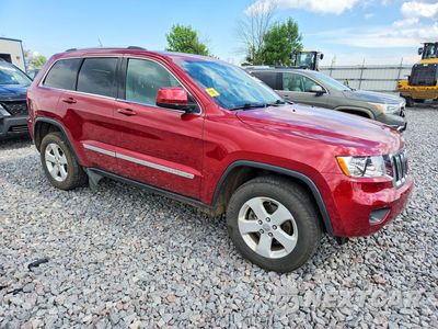 Czwarte zdjęcie samochodu z boku: 2013 JEEP GRAND CHEROKEE LAREDO VIN:1C4RJFAG6DC594777 - miniatura