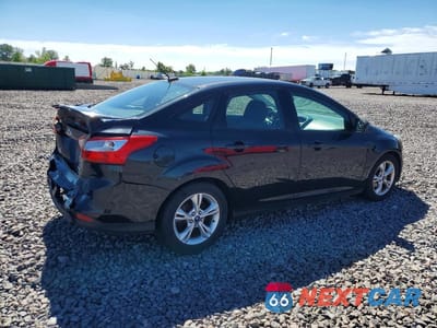 Trzecie zdjęcie samochodu z tyłu: 2012 FORD FOCUS SE VIN:1FAHP3F23CL457208 - miniatura