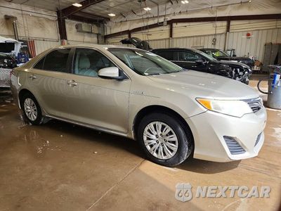 Czwarte zdjęcie samochodu z boku: 2014 TOYOTA CAMRY HYBRID LE VIN:4T1BD1FK4EU123680 - miniatura