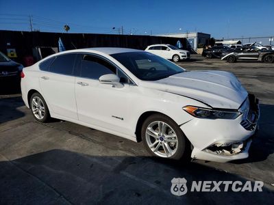 Czwarte zdjęcie samochodu z boku: 2018 FORD FUSION SE HYBRID VIN:3FA6P0LU6JR172111 - miniatura