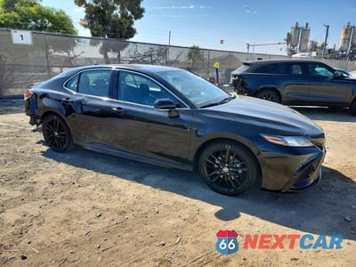 Czwarte zdjęcie samochodu z boku: 2024 TOYOTA CAMRY XSE VIN:4T1K61AK7RU877521 - miniatura