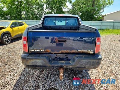 Zdjęcie 6 z 12 samochodu: 2011 HONDA RIDGELINE RT VIN:5FPYK1F21BB005036 - miniatura