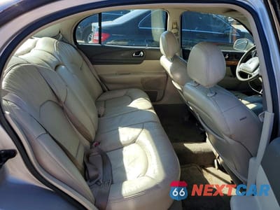 Zdjęcie 10 z 12 samochodu: 2002 LINCOLN CONTINENTAL VIN:1LNHM97V62Y699843 - miniatura