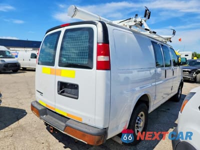 Trzecie zdjęcie samochodu z tyłu: 2013 CHEVROLET EXPRESS G2500 VIN:1GCWGFCA7D1192983 - miniatura