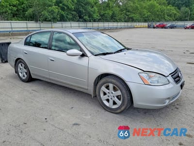 Czwarte zdjęcie samochodu z boku: 2003 NISSAN ALTIMA 2.5 VIN:1N4AL11D33C174656 - miniatura