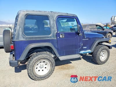 Trzecie zdjęcie samochodu z tyłu: 1999 JEEP WRANGLER VIN:1J4FY29P2XP472503 - miniatura