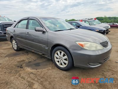 Czwarte zdjęcie samochodu z boku: 2002 TOYOTA CAMRY XLE V6 VIN:4T1BF30K52U513679 - miniatura