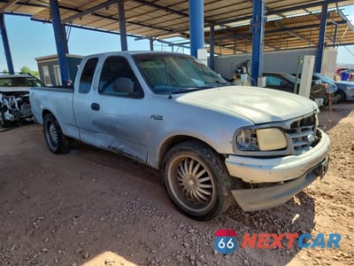 Czwarte zdjęcie samochodu z boku: 2000 FORD F150 VIN:1FTZX1728YNA66472 - miniatura
