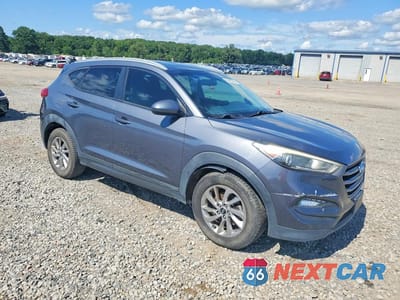 Czwarte zdjęcie samochodu z boku: 2016 HYUNDAI TUCSON SE VIN:KM8J33A4XGU114519 - miniatura