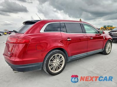 Trzecie zdjęcie samochodu z tyłu: 2015 LINCOLN MKT VIN:2LMHJ5AT2FBL04573 - miniatura