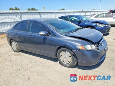 Czwarte zdjęcie samochodu z boku: 2007 HONDA CIVIC HYBRID VIN:JHMFA36237S029264 - miniatura