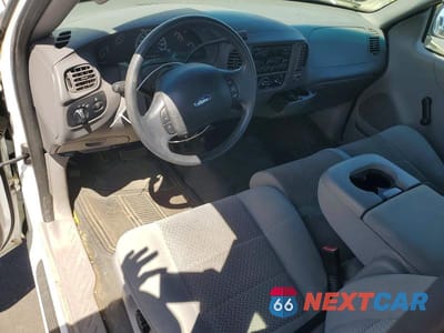 Zdjęcie 8 z 12 samochodu: 2002 FORD F-150 VIN:1FTRX17W02NB82565 - miniatura