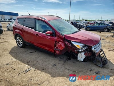 Czwarte zdjęcie samochodu z boku: 2018 FORD ESCAPE TITANIUM VIN:1FMCU0J90JUD03378 - miniatura