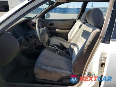 Zdjęcie 7 z 12 samochodu: 1997 TOYOTA COROLLA DX VIN:1NXBB02E9VZ515263 - miniatura