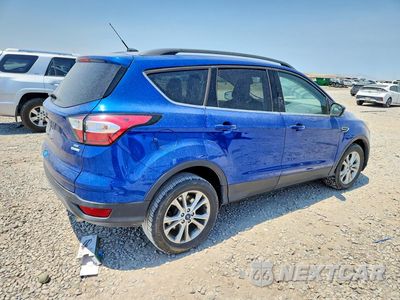 Trzecie zdjęcie samochodu z tyłu: 2018 FORD ESCAPE SE VIN:1FMCU0GD7JUC90754 - miniatura