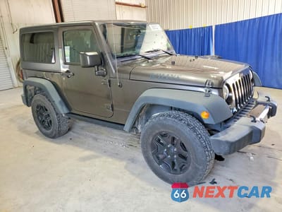 Czwarte zdjęcie samochodu z boku: 2016 JEEP WRANGLER SPORT VIN:1C4GJWAG9GL171025 - miniatura