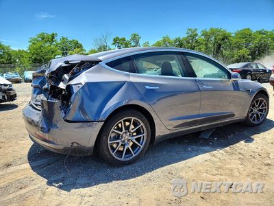 Trzecie zdjęcie samochodu z tyłu: 2019 TESLA MODEL 3 VIN:5YJ3E1EB2KF386150 - miniatura