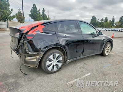 Trzecie zdjęcie samochodu z tyłu: 2023 TESLA MODEL Y VIN:7SAYGDEE0PA097318 - miniatura