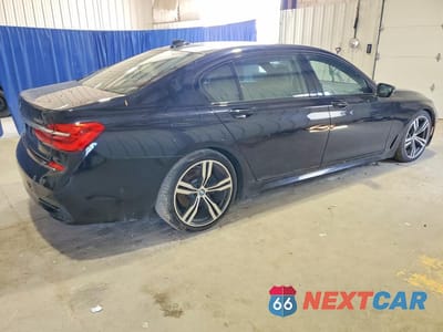 Trzecie zdjęcie samochodu z tyłu: 2016 BMW 740 I VIN:WBA7E2C58GG548104 - miniatura