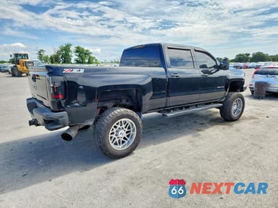 Trzecie zdjęcie samochodu z tyłu: 2015 CHEVROLET SILVERADO K2500 HEAVY DUTY LT VIN:1GC1KVE88FF129801 - miniatura