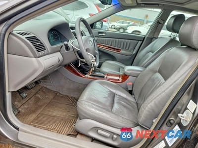 Zdjęcie 7 z 12 samochodu: 2002 TOYOTA CAMRY XLE V6 VIN:4T1BF30K52U513679 - miniatura