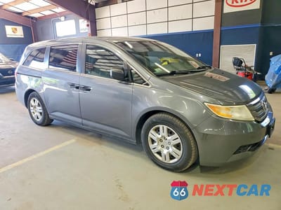 Czwarte zdjęcie samochodu z boku: 2012 HONDA ODYSSEY LX VIN:5FNRL5H24CB073511 - miniatura