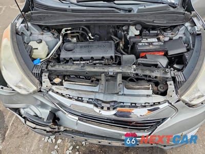 Zdjęcie 12 z 13 samochodu: 2010 HYUNDAI TUCSON LIMITED VIN:KM8JUCAC7AU023249 - miniatura