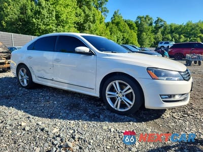 Czwarte zdjęcie samochodu z boku: 2015 VOLKSWAGEN PASSAT SE VIN:1VWBT7A30FC005124 - miniatura
