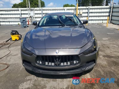 Piąte zdjęcie samochodu w środku: 2014 MASERATI GHIBLI S VIN:ZAM57RTAXE1125207 - miniatura