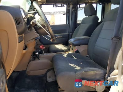 Zdjęcie 7 z 12 samochodu: 2012 JEEP WRANGLER UNLIMITED RUBICON VIN:1C4BJWFGXCL178580 - miniatura