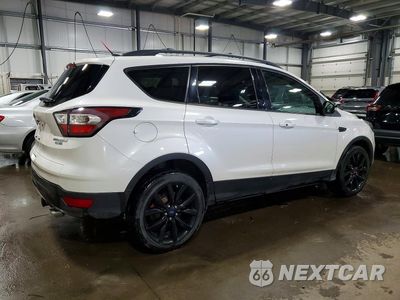 Trzecie zdjęcie samochodu z tyłu: 2017 FORD ESCAPE TITANIUM VIN:1FMCU9J98HUA26607 - miniatura