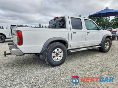 Trzecie zdjęcie samochodu z tyłu: 2000 NISSAN FRONTIER XE VIN:1N6ED27TXYC385287 - miniatura