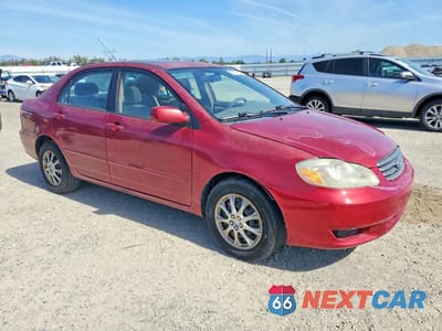 Czwarte zdjęcie samochodu z boku: 2003 TOYOTA COROLLA LE VIN:2T1BR32E33C073396 - miniatura