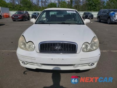 Piąte zdjęcie samochodu w środku: 2004 HYUNDAI SONATA GL VIN:KMHWF25S94A970875 - miniatura