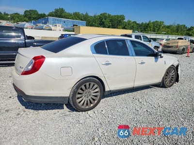 Trzecie zdjęcie samochodu z tyłu: 2013 LINCOLN MKS VIN:1LNHL9DK6DG601111 - miniatura
