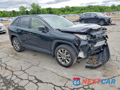 Czwarte zdjęcie samochodu z boku: 2019 TOYOTA RAV4 XLE PREMIUM VIN:JTMA1RFV3KJ003075 - miniatura